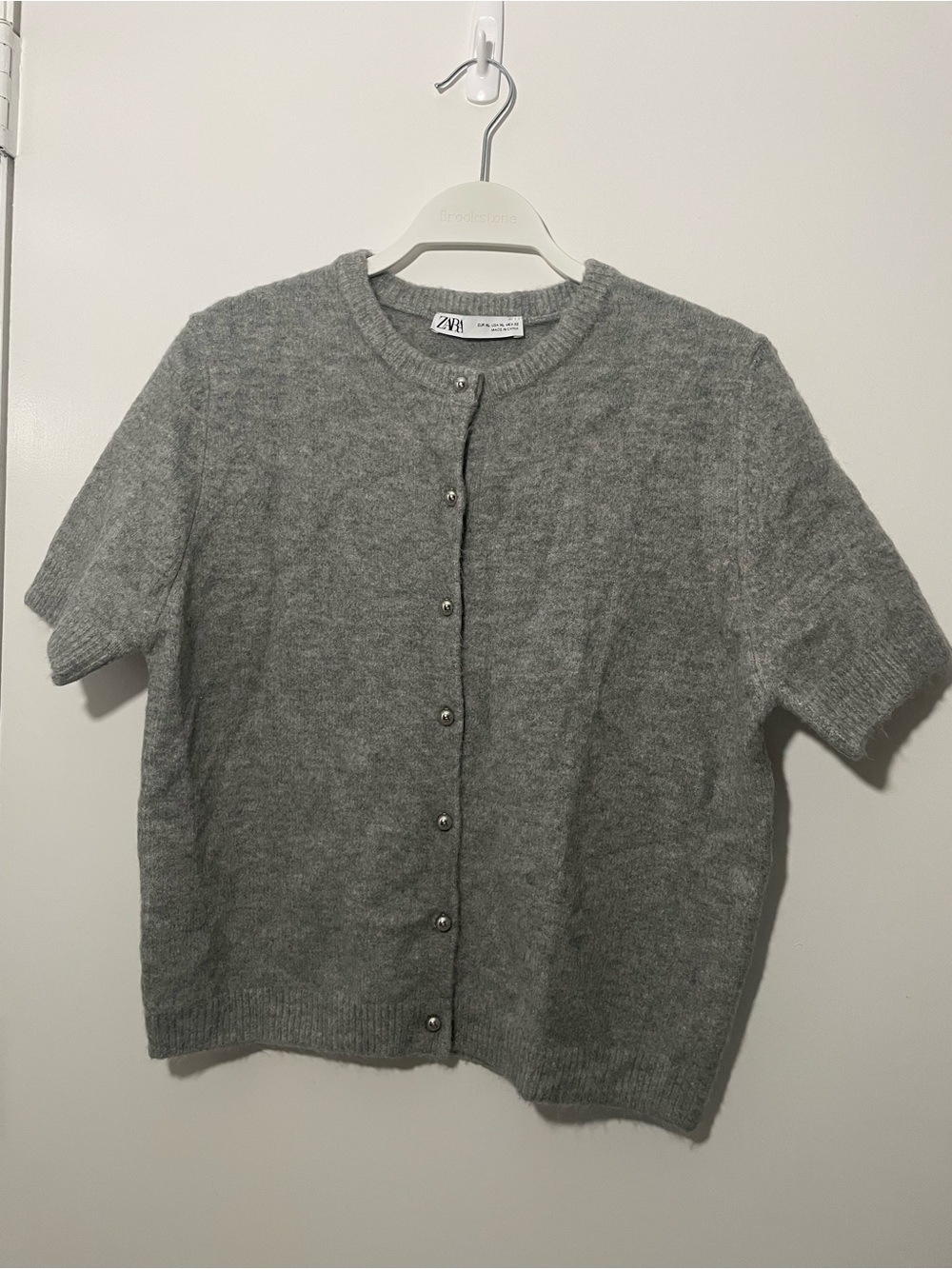 Zara Women’s short sleeve grey cardigan with silver round buttons. XL Like new.